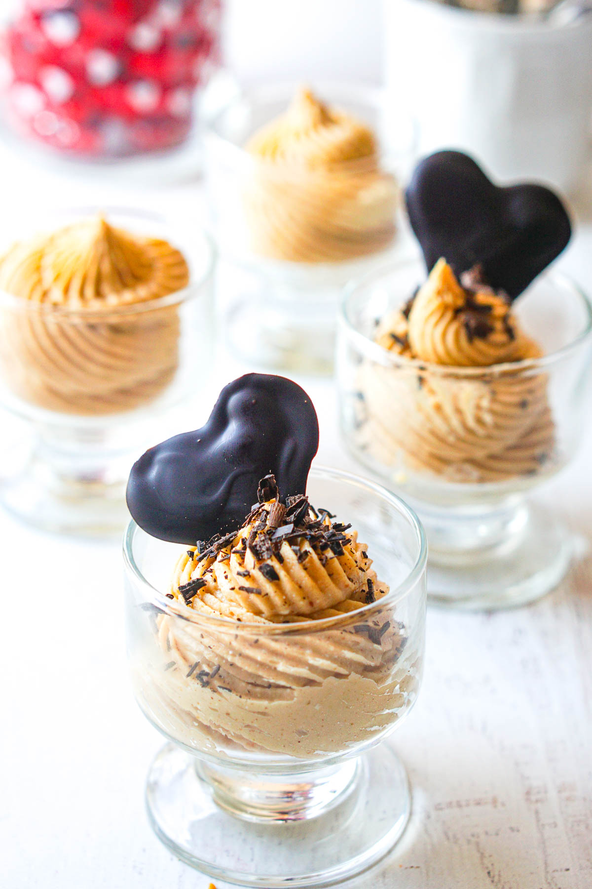 4 glass dishes with sugar free peanut butter cream cheese fluff with chocolate valentines hearts