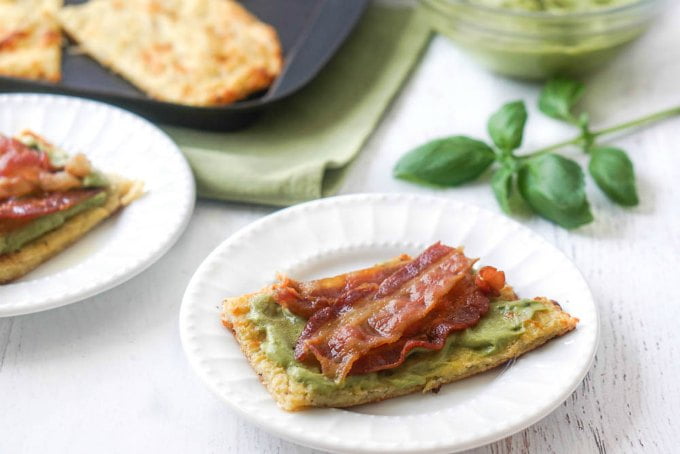 low carb bacon sandwich with avocado spread and fresh basil