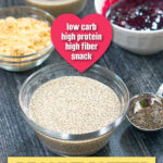 Glass bowl with peanut butter chia pudding and bowl of berry "jelly" sauce and text overlay.