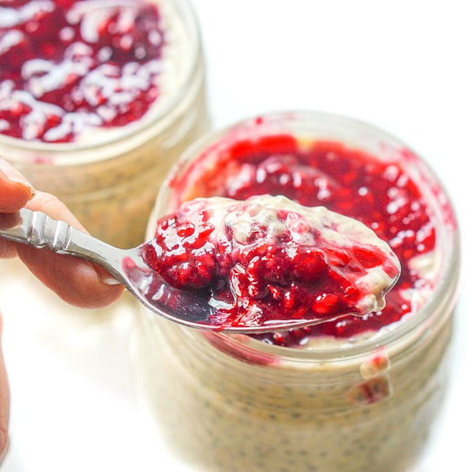 A closeup of a spoonful of peanut butter chia pudding with jelly