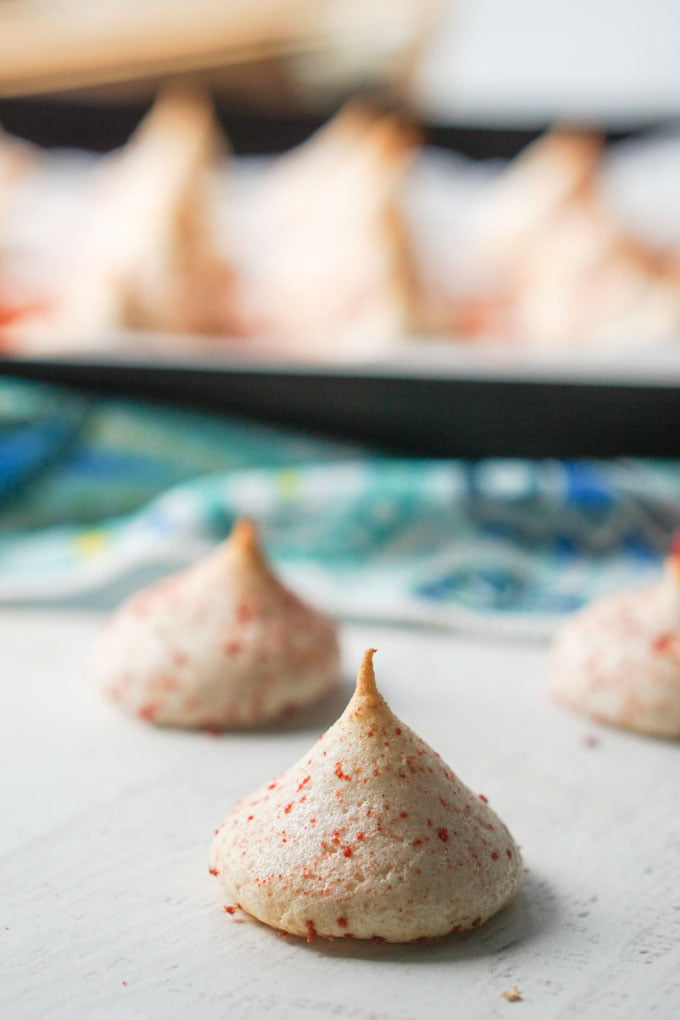 meringue cookies with cookie tray in background