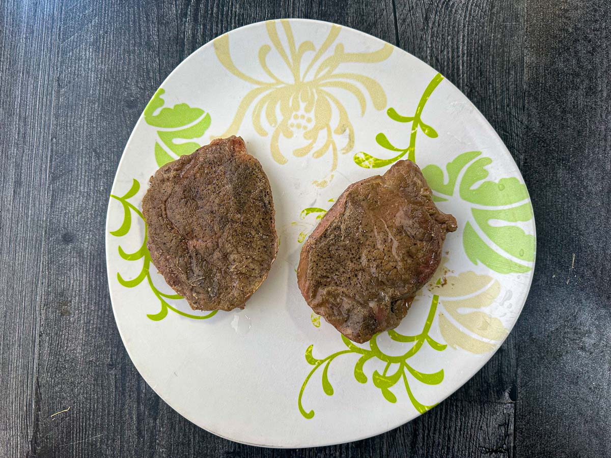 plate with two steaks right out of the sous vide machine