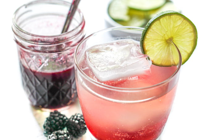 tequila sunset drink with sugar free blackberry sauce