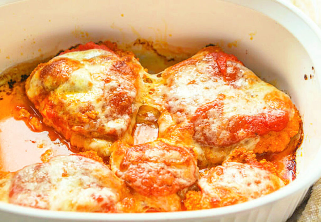 baking dish with chicken parmesan cutlets