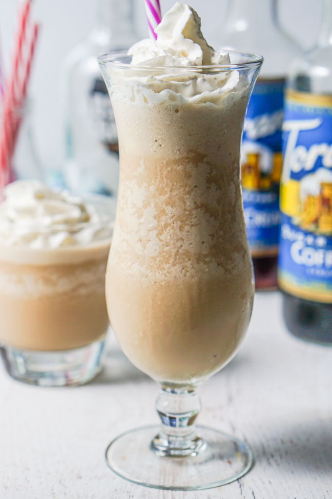 glasses of frozen mudslide with torani syrup and straws in background