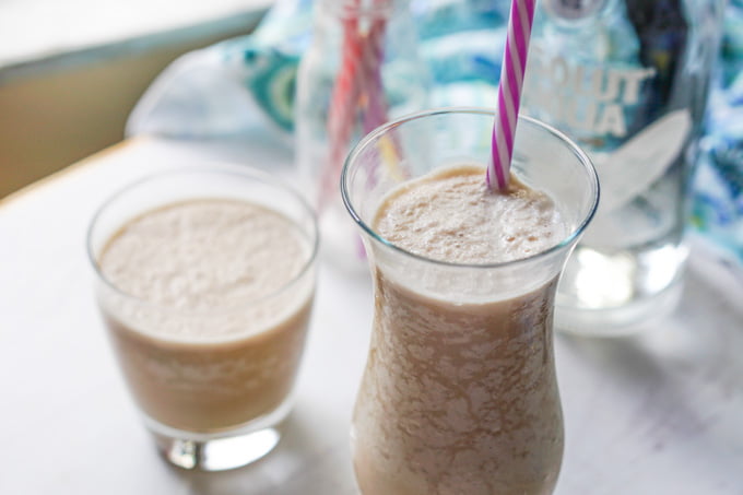 closeup of glasses of low carb mudslide with a straw and without whipped cream on top