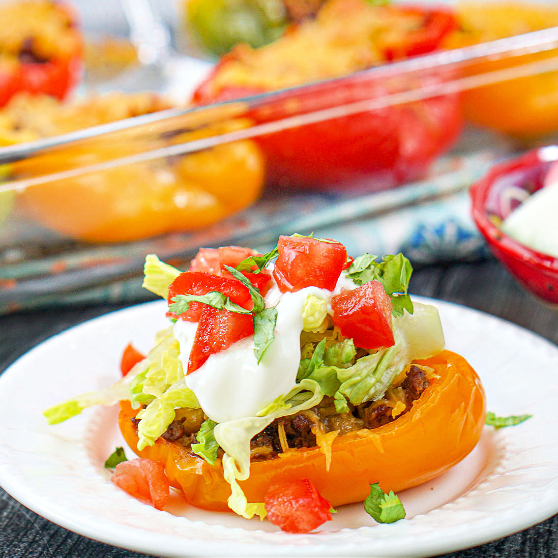 closeup of a keto taco stuffed pepper with taco toppings