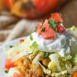 taco stuffed peppers with toppings and text