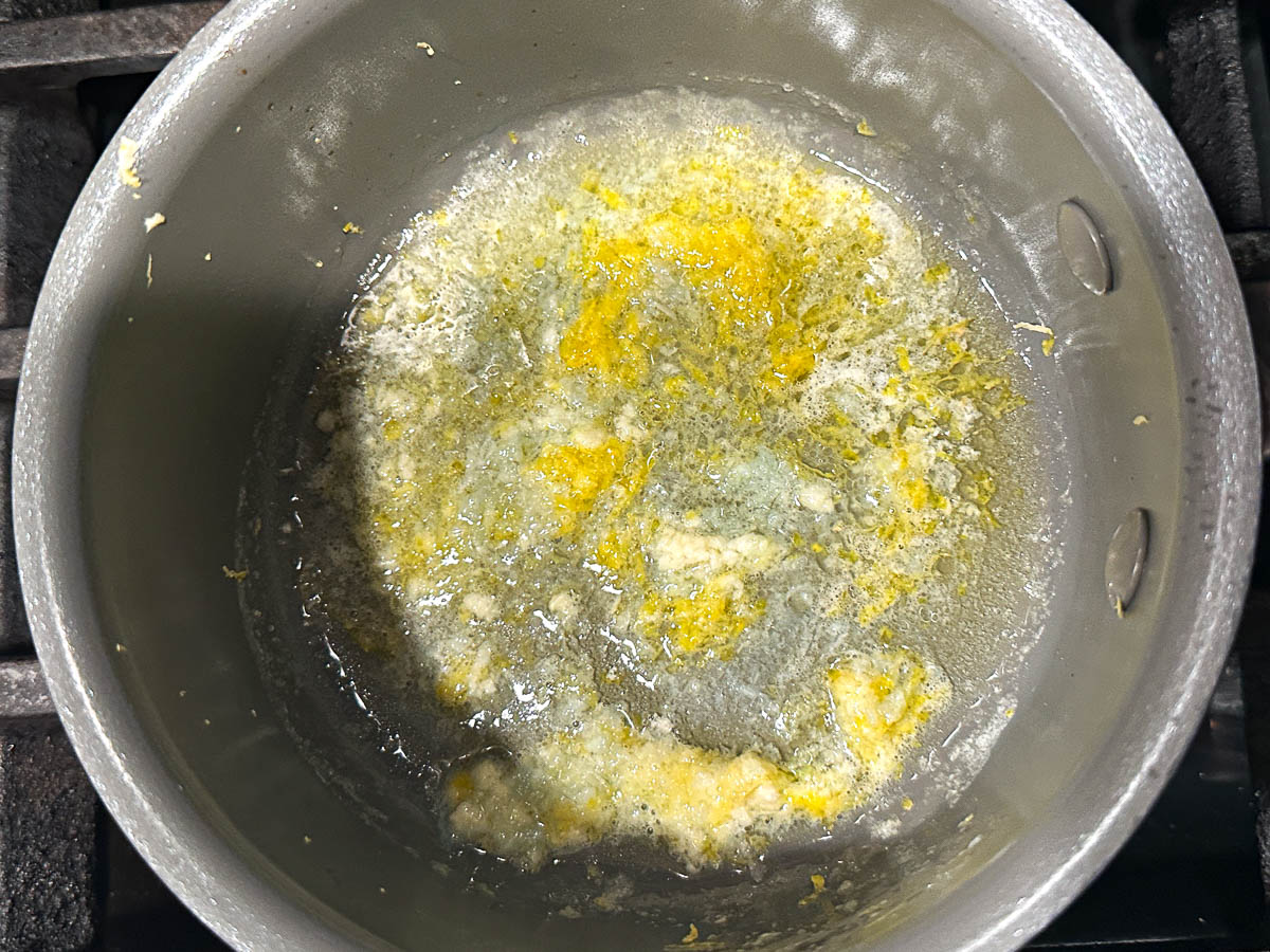 Pan with butter, garlic and lemon zest.