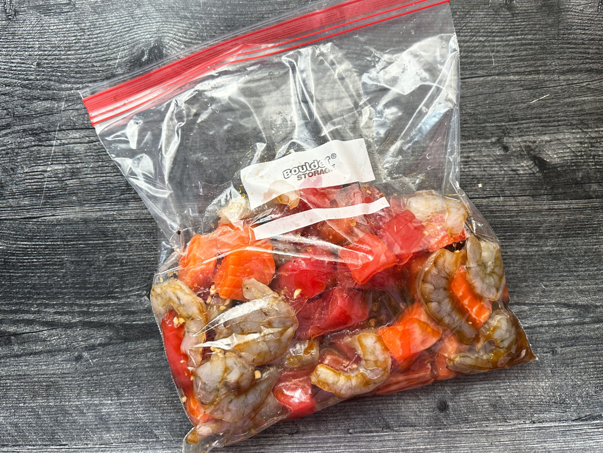 Ziplock bag with marinated shrimp tuna and salmon.