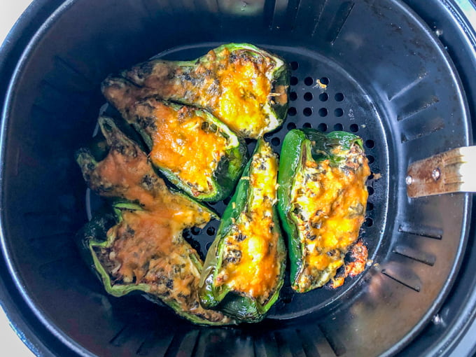 cooked stuffed peppers in air fryer basket