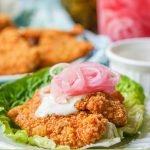 mini keto fried chicken slider on lettuce wrap with text overlay