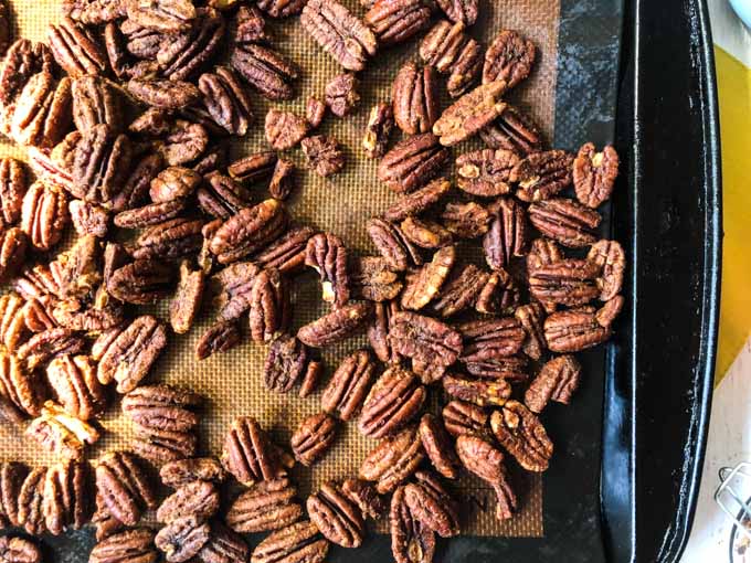 roasted pecans on cookie sheet