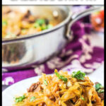 White plate with a serving of keto beef and cabbage stir fry dish and text.