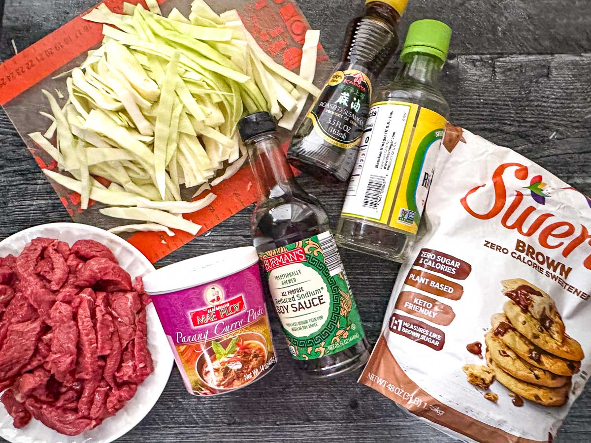 Recipe ingredients I used - beef slices, Mae Ploy Thai curry paste, soy sauce, swerve brown sweetener, rice vinegar, cabbage and seasame oil.