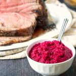bowl of beet & horseradish sauce and sliced prime rib roast with text