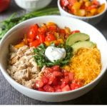 white keto burrito bowl with toppings and text