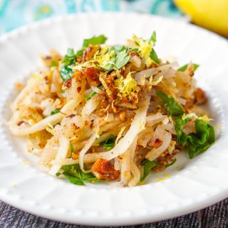 white plate of the low carb veggie noodles with pecan crumb topping