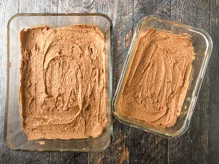two glass containers with the sugar free chocolate hazelnut fudge batter 