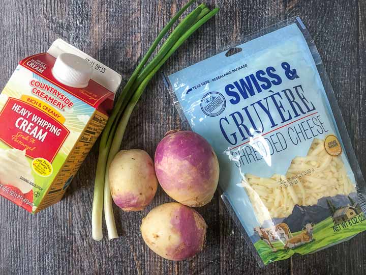 ingredients to make keto scalloped turnips: Heavy cream, turnips, green onions and gruyere Swiss cheese