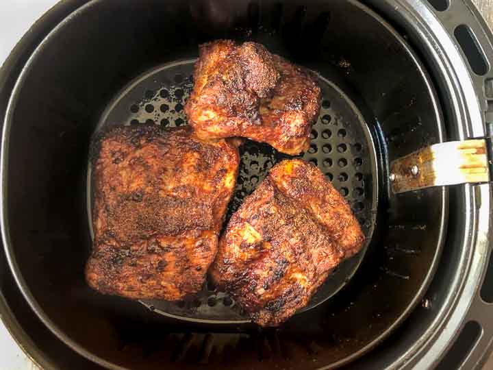 air fryer basket with cooked bbq keto baby back ribs