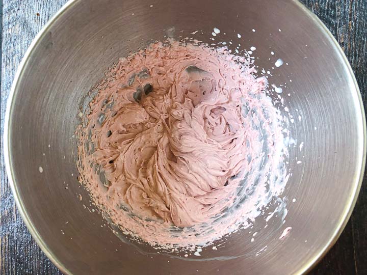 silver mixing bowl with berry cream cheese spread