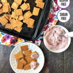 cookie sheet with keto peanut crackers and berry cream cheese and text