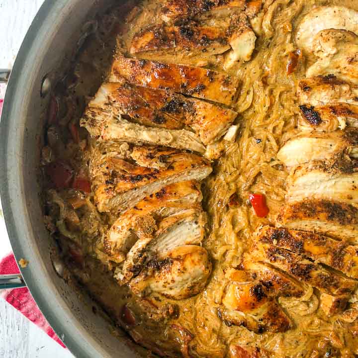 closeup of skillet with low carb cajun chicken spaghetti squash dinner