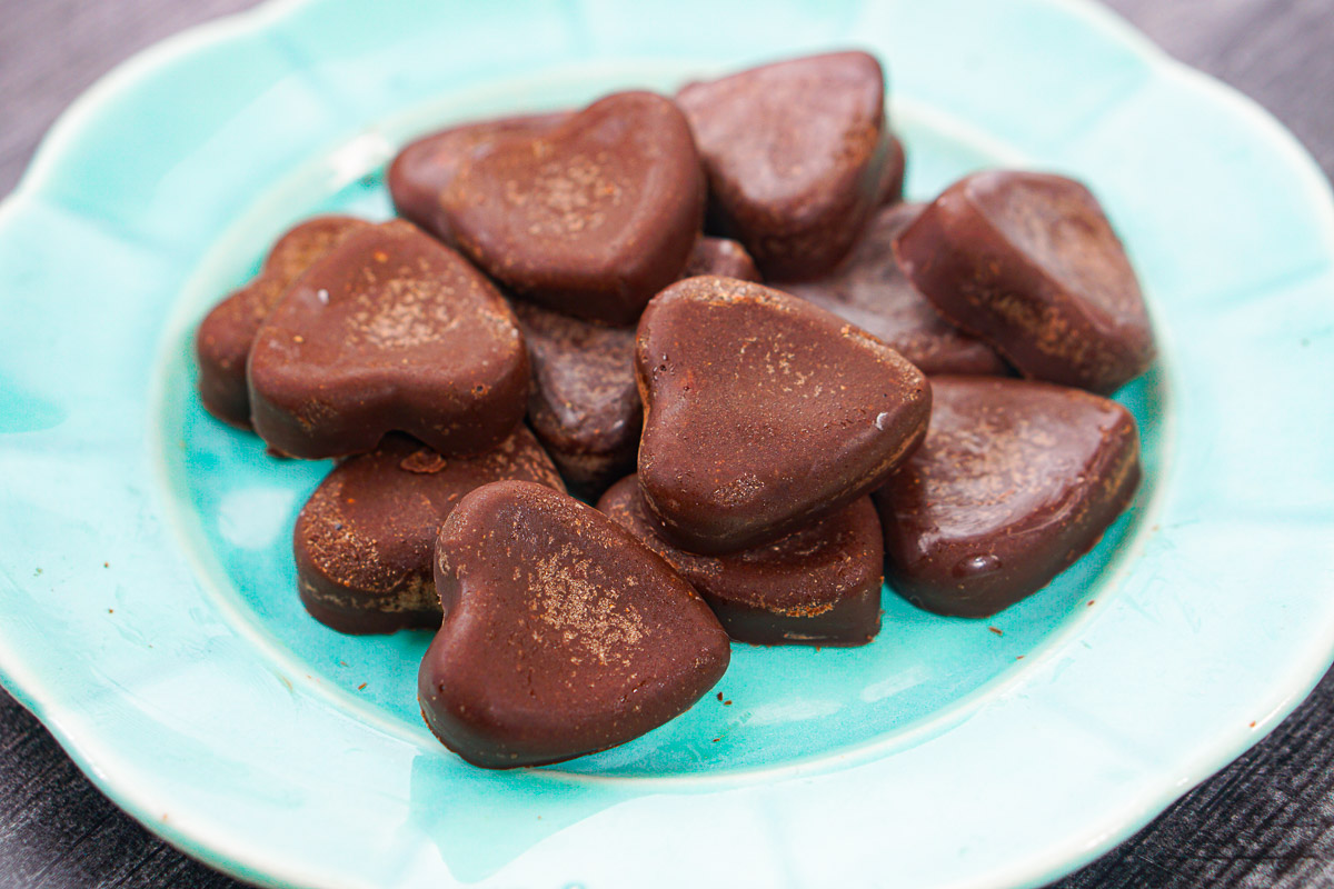 closeup of an aqua plate with low carb sugar free chocolate pb candies