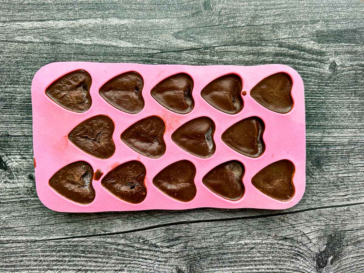pink heart mold with finished keto candy