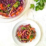 bowls of low carb rainbow asian slaw, cilantro and text