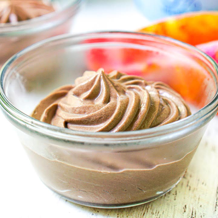 glass bowl with low carb chocolate soft serve ice cream