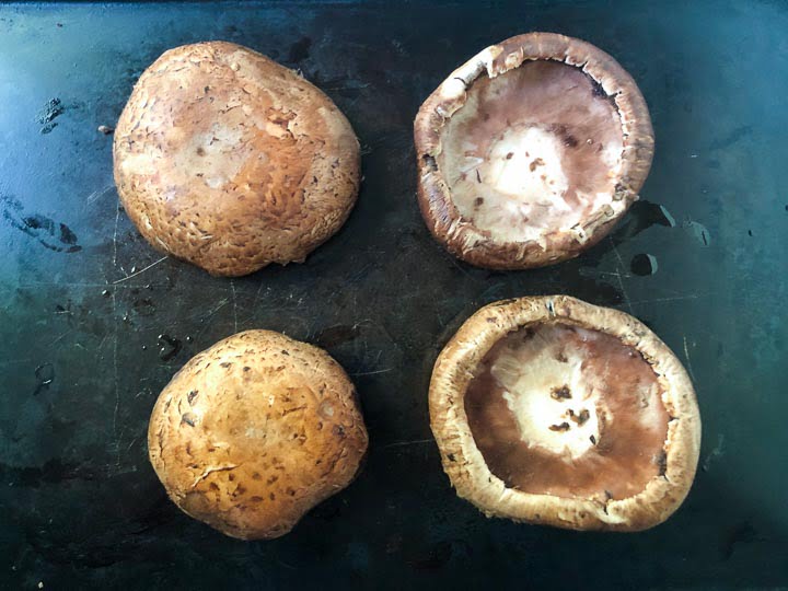 4 raw cleaned portobello mushroom caps