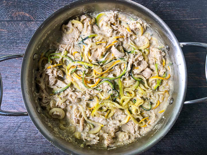 pan of parmesan zoodles with shredded chicken