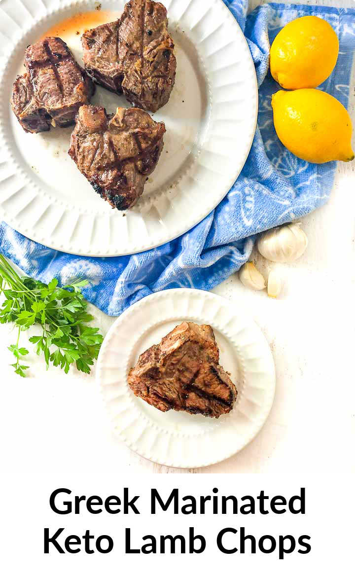 white plates with keto Greek lamb chops with lemons and blue towel and text overlay