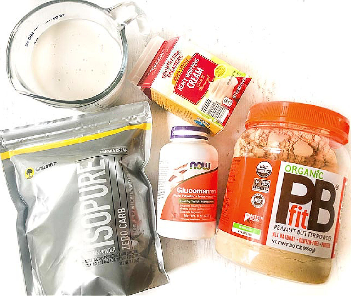 Recipe ingredients - almond milk, heavy cream, pbfit, isopure banana protein powder, glucomannan powder.