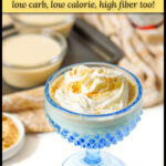 Closeup of a blue dessert dish with high protein banana pudding with whipped cream with text.