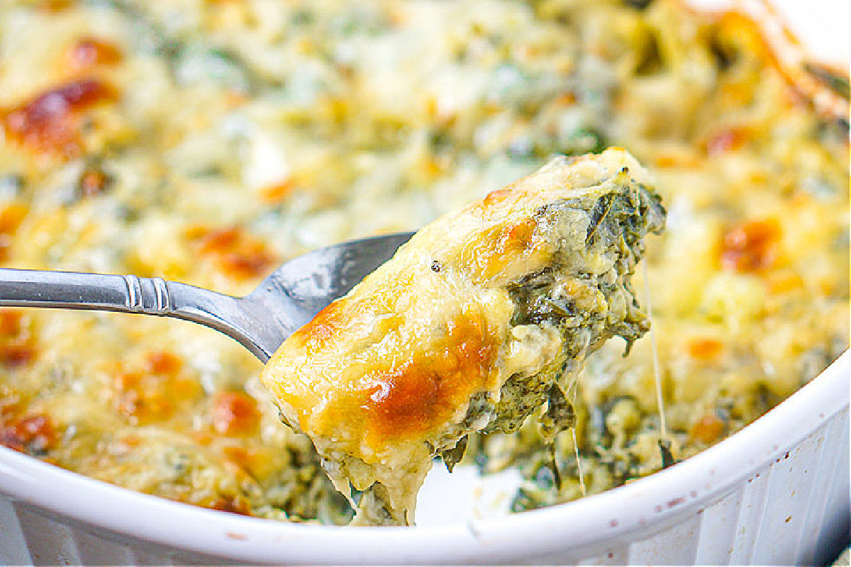 Closeup of a spoonful of the keto broccoli cheese casserole.