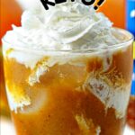 glass with keto pumpkin pie cocktail with pumpkins and bottles in the background and text overlay