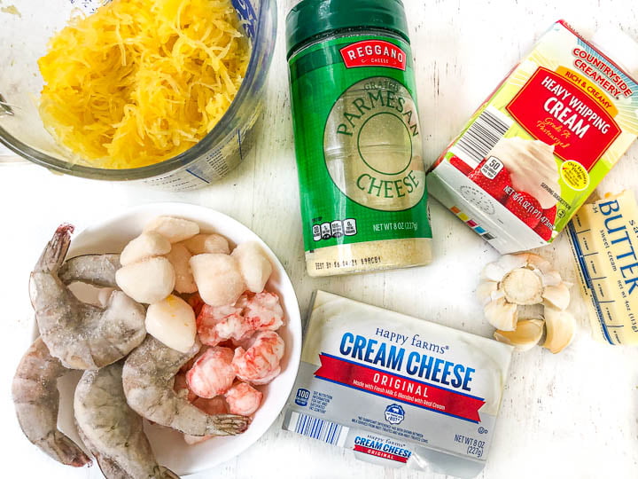 ingredients used to make seafood alfredo with spaghetti squash: spaghetti squash, parmesan cheese, heavy cream, butter, garlic, cream cheese and seafood