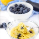 two glass dishes with 1 minute blueberry muffins and a bowl of blueberries with text