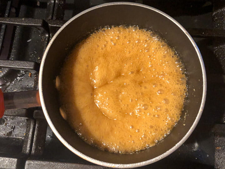 pan with a bubbling sugar free butterscotch sauce