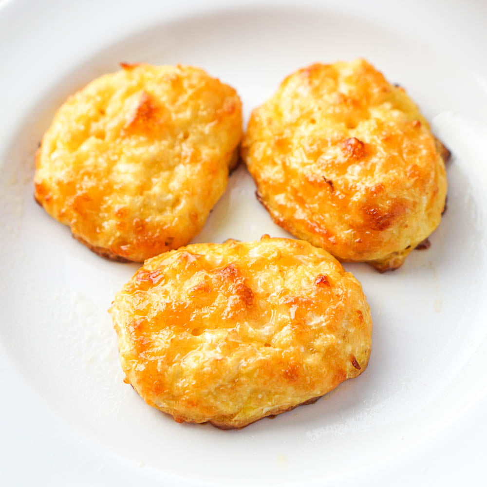 3 keto caulilfower tater tots on a white plate