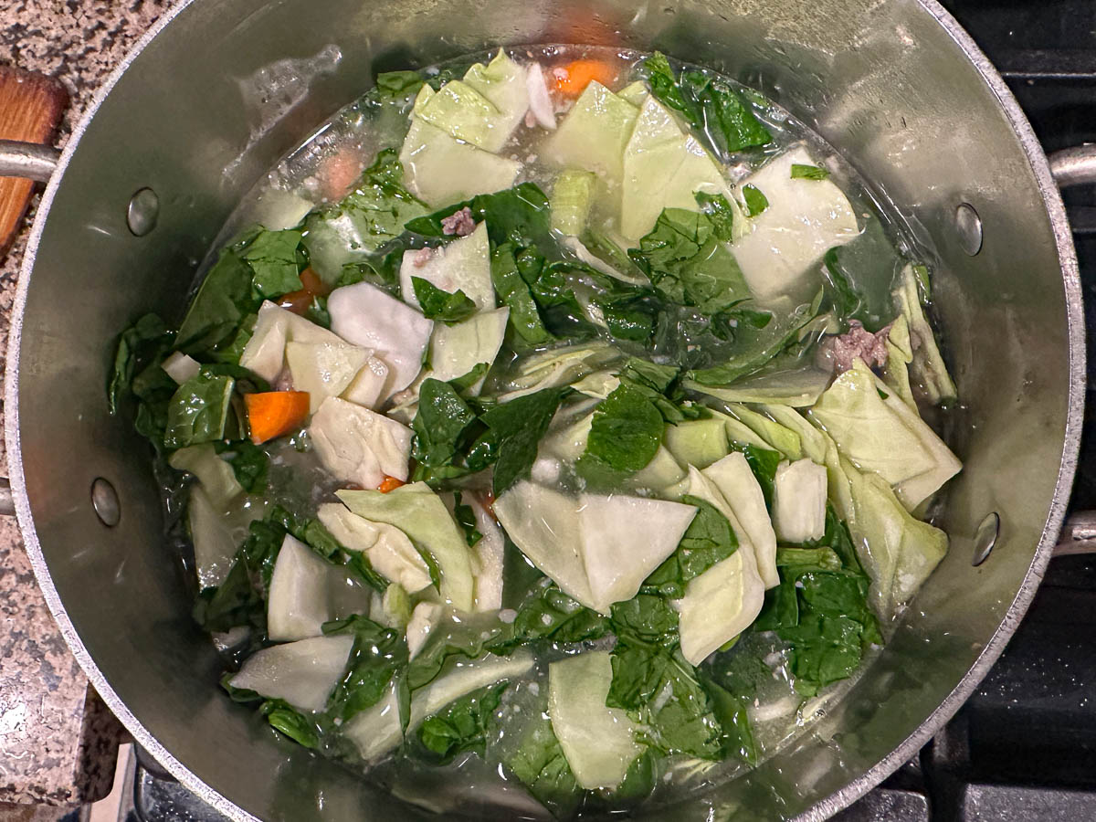 Pot with all the ingredients ready to cook down.