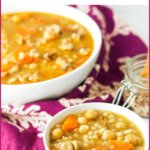 white bowl with Instant Pot chicken barley soup and colorful purple tea towel and text overlay