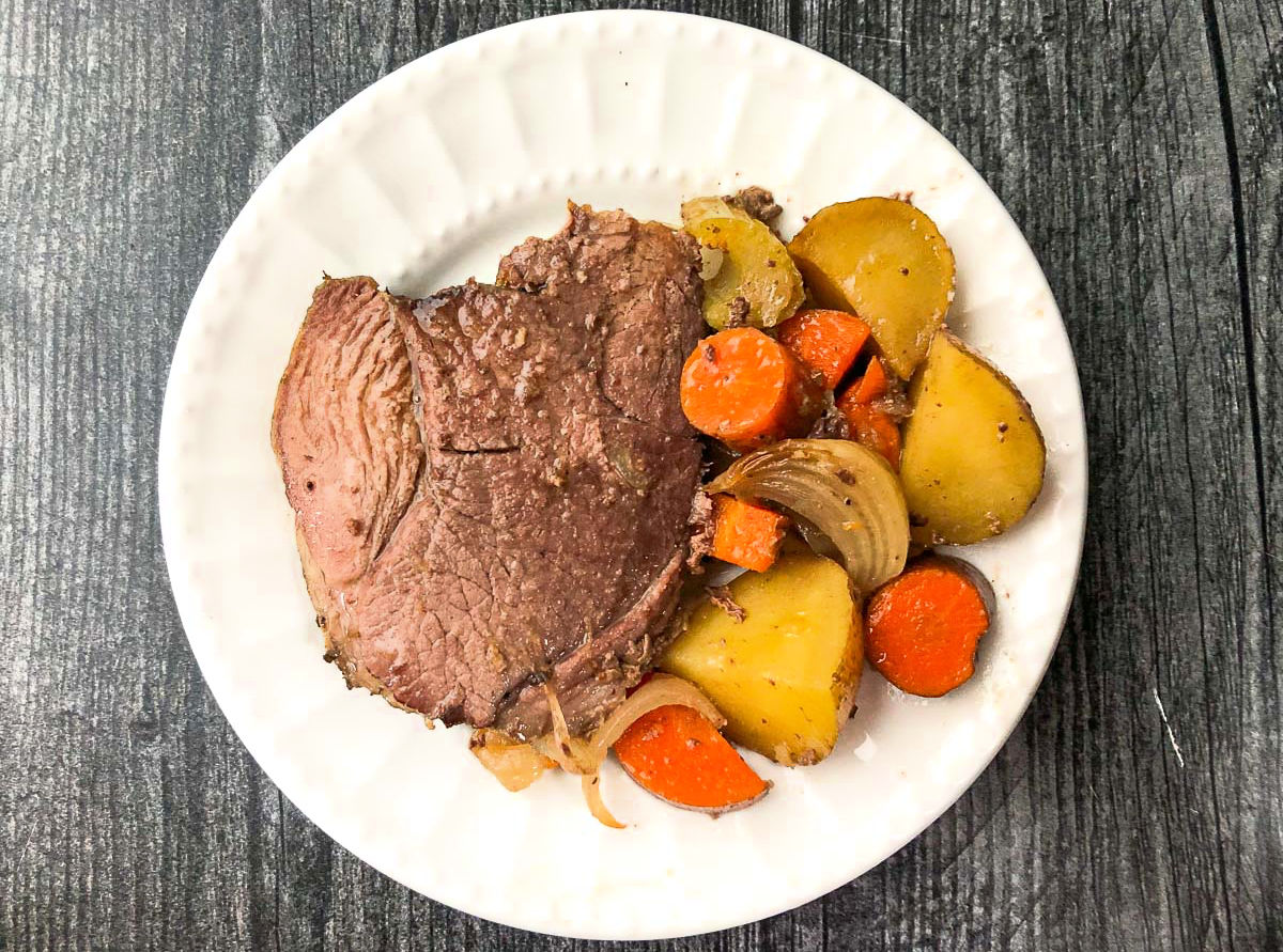 closeup of a plate with a serving of the finished slow cooker meal