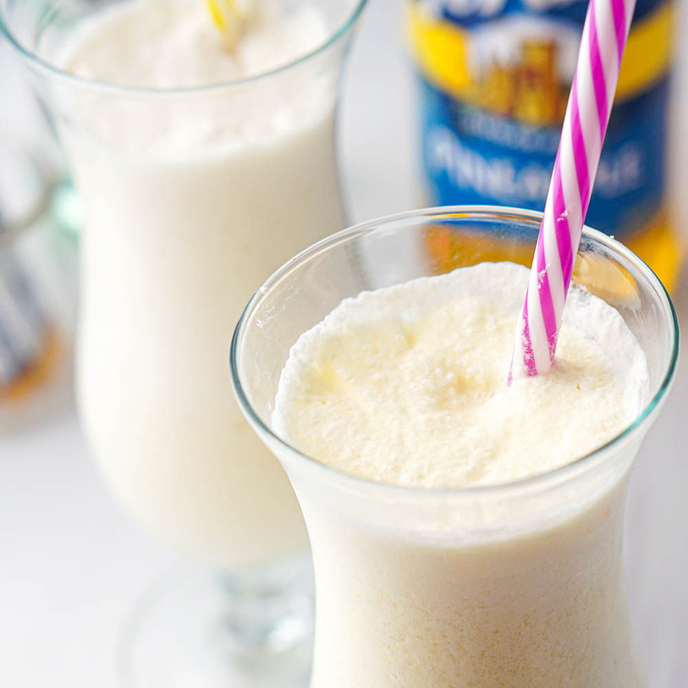 closeup of a tall glass with keto pina colada drinks