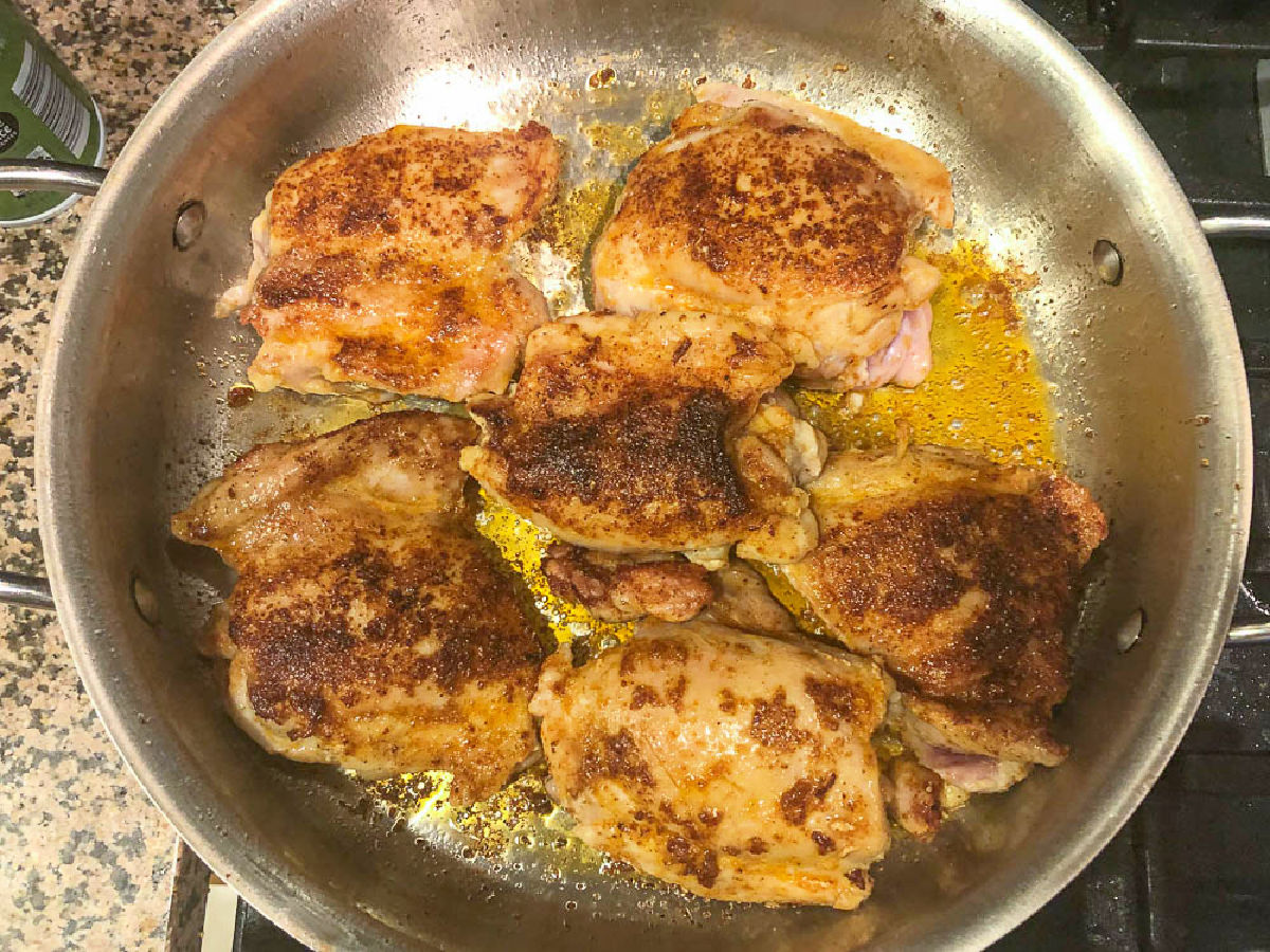 pan with thigh browned on one side