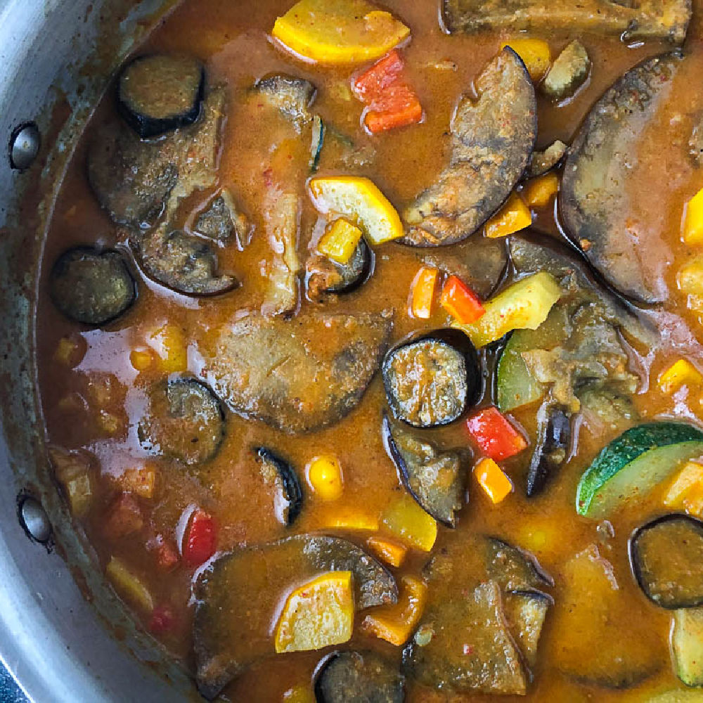 closeup of a pan of egg plant curry