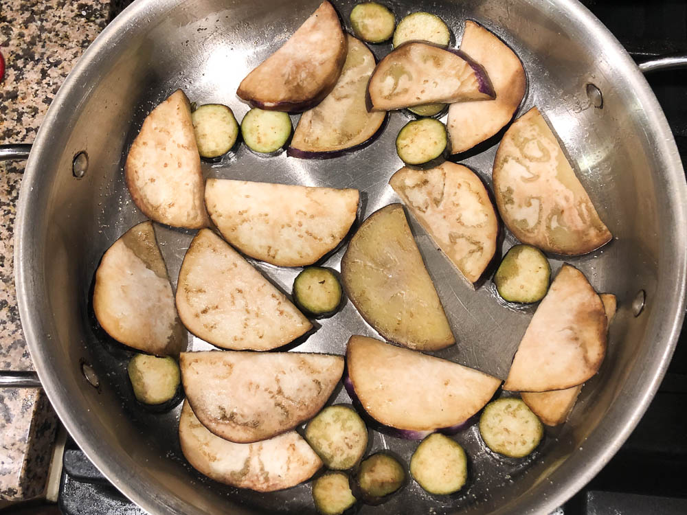 pan with frying eggplant slices